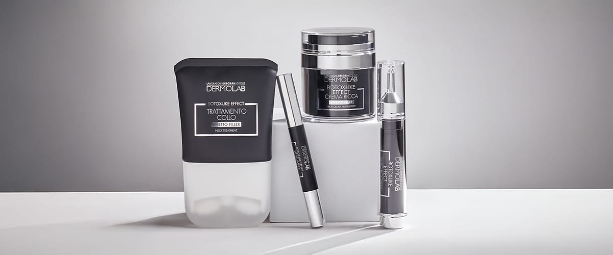 Prodotti Botox-like effect Dermolab su sfondo grigio tenue