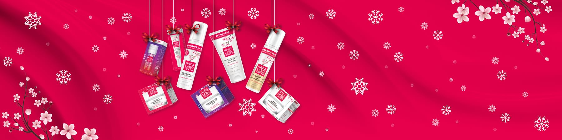 Prodotti skincare HADA LABO TOKYO su sfondo rosso con fiori e fiocchi di neve