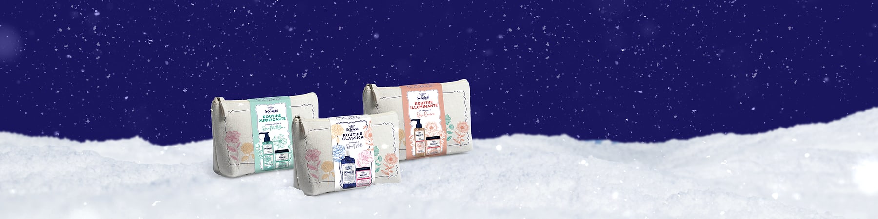 Set natalizi Acqua alle Rose con routine purificante classica e illuminante su sfondo innevato