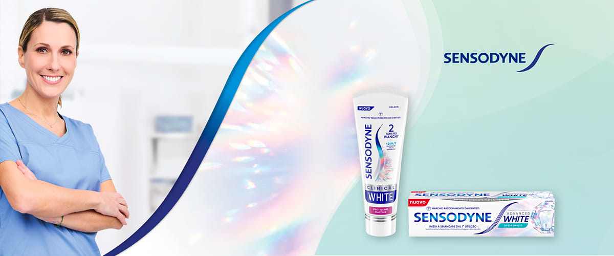 Donna con camice medico accanto a confezioni di dentifricio Sensodyne clinical white