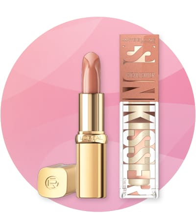 Ruj și iluminator pe fundal roz