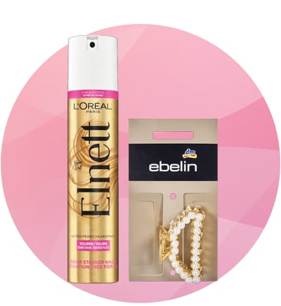 Spray de păr L'Oreal Elnett și accesorii de păr ebelin pe fundal roz