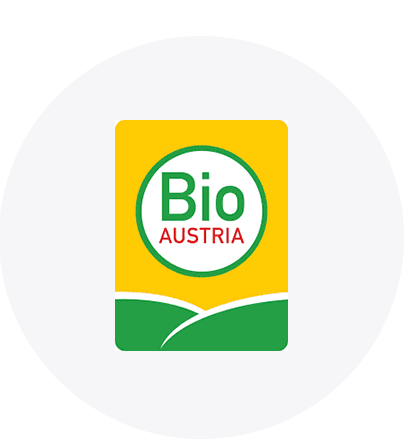 Sigla Bio Austria pe fundal galben și verde