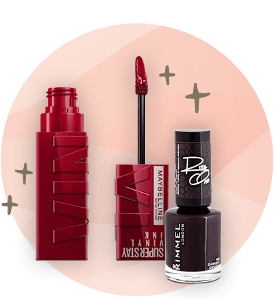 Ruj Maybelline și oja Rimmel pe fundal roz cu stele decorative