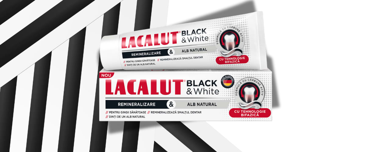 Cutie și tub de pastă de dinți Lacalut Black & White pe fundal alb-negru
