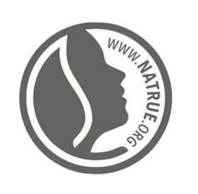 Siglă rotundă cu profil de față și formă de picătură și text www.natrue.org