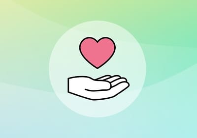 Markt mit einem Herz in der Mitte, darunter eine Hand