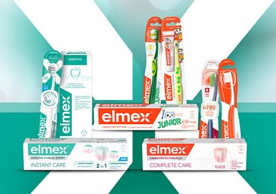 Diverse produse dentare Elmex pe fundal verde