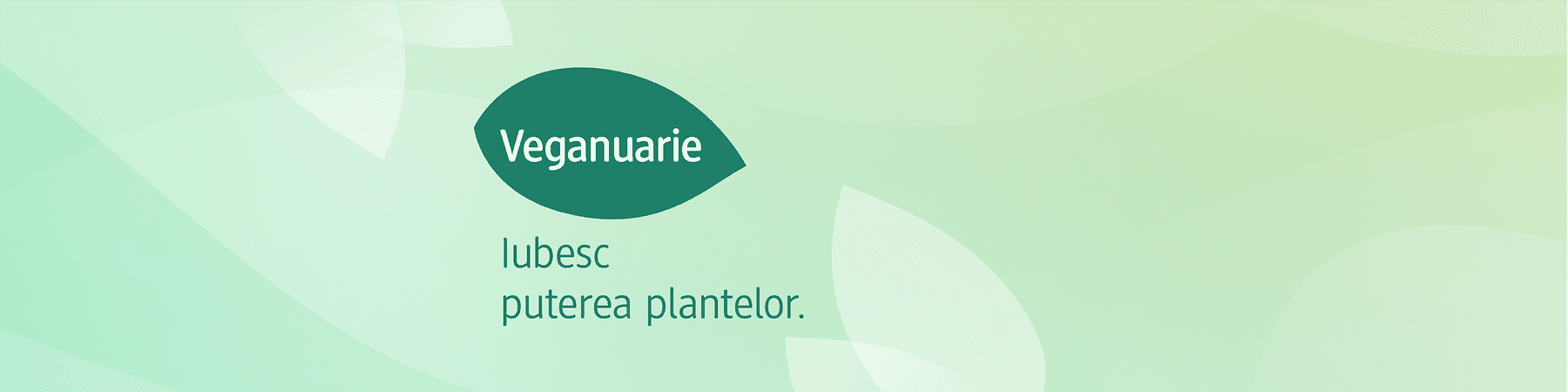 Logo Veganuary cu textul Iubesc puterea plantelor pe fundal verde.