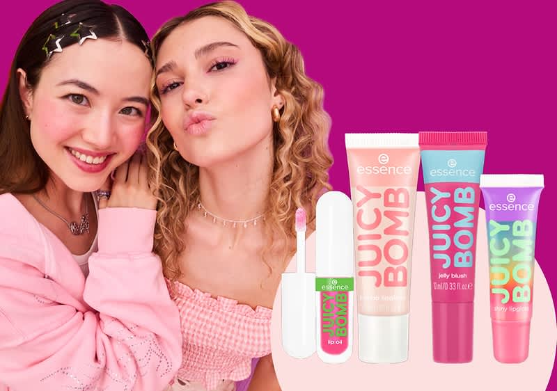 Produse cosmetice Essence Juicy Bomb pe fundal roz