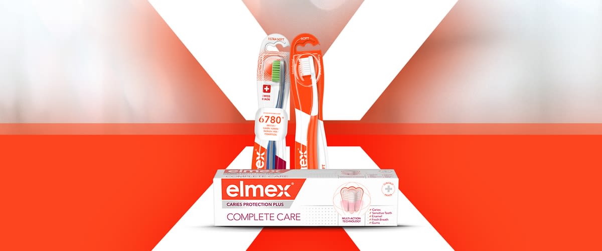 Periuțe de dinți Elmex Complete Care în ambalaj promoțional
