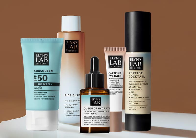Produse cosmetice Elyn's Lab pe fundal maro