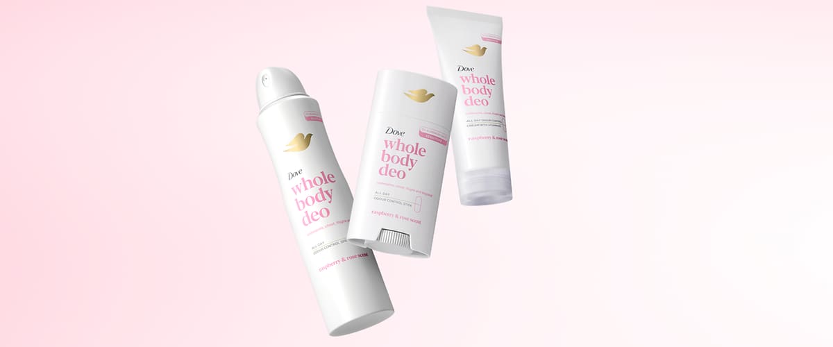 Deodorant Dove whole body deo pe fundal roz pal