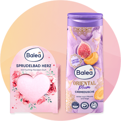 Balea sprchový gél Oriental Plum a kúpeľová bomba v tvare srdca s kvetinovým dizajnom.