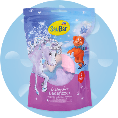 Balenie kúpeľových bômb s obrázkom jednorožca a medveďa na obale