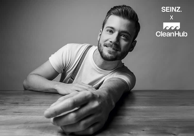muž a logo SEINZ. v spoluvpráci s CleanHub