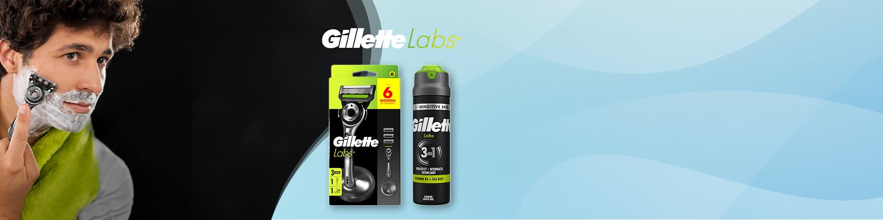Holiaci strojček a pena na holenie Gillette Labs na modrom pozadí.