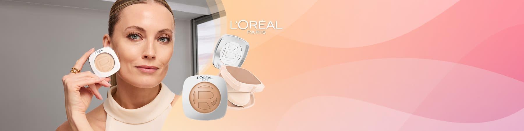 Dvaja mladí ženy zobrazené spredu a zboku, obe s dlhými lesklými tmavými hladkými vlasmi, vpravo dve ružovo-bie­le fľaše L'Oréal Paris Elseve s textom „Ultimate Glycolic Gloss“ a nápisom „L'Oréal Paris“ v hornom rohu