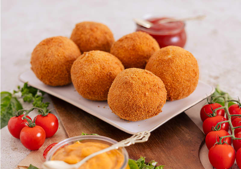 Arancini s šunko in sirom