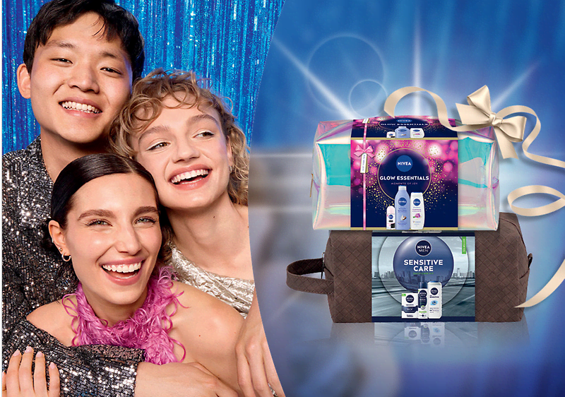 Alt-Text Darilni set Nivea z izdelki za nego kože ob bleščečem ozadju