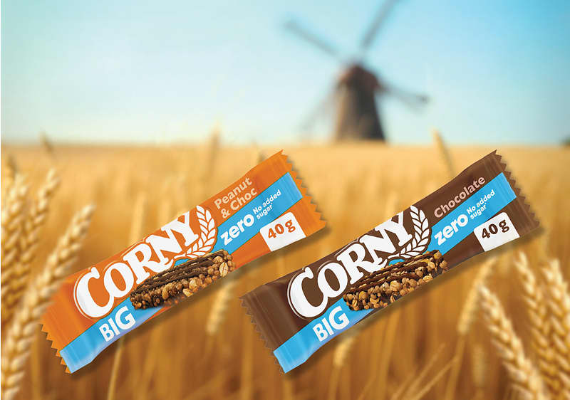 Alt-Text Pšenično polje z vetrnico v ozadju in čokoladico