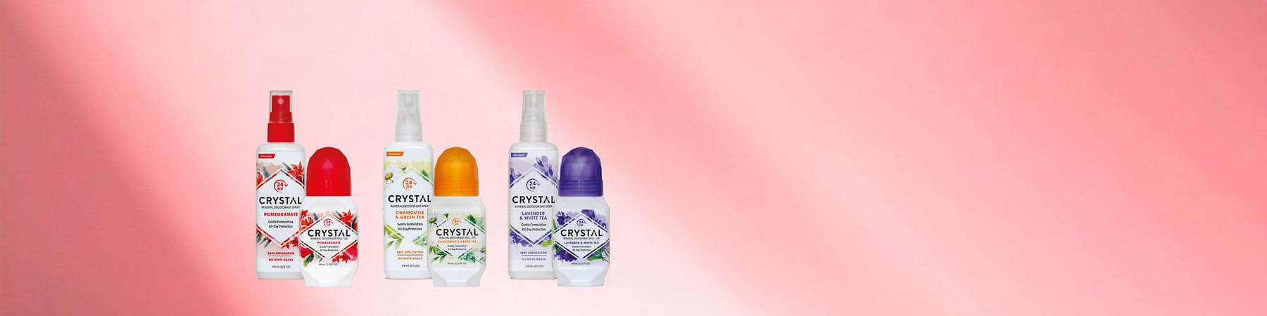 Alt-Text Različni Crystal deodoranti na roza ozadju