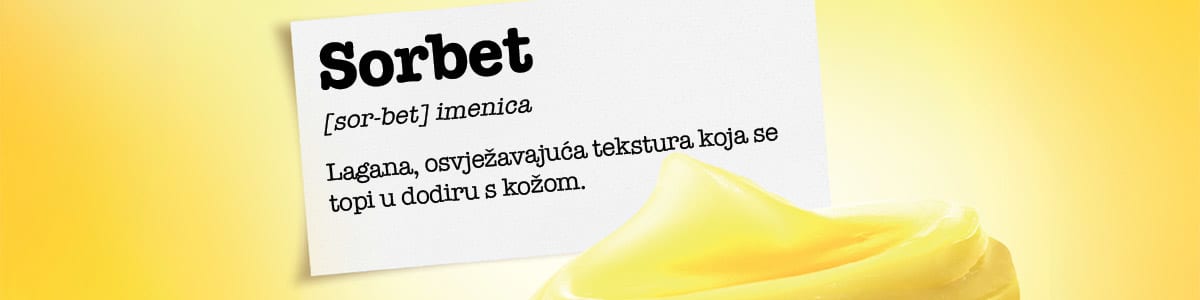 Slika koja prikazuje pakovanje sorbeta sa žutom kremastom kuglicom sorbet