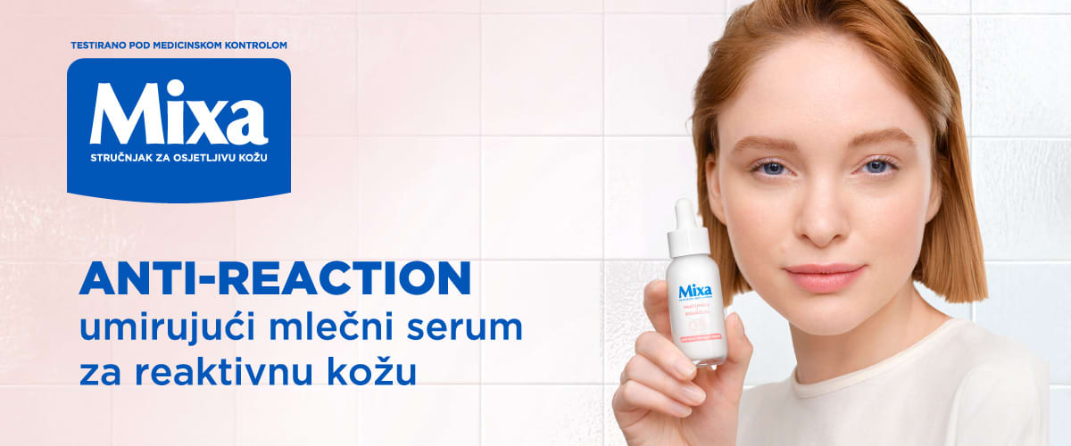 Slika koja prikazuje ženu kako drži bočicu seruma za lice marki Mixa ključna reč: serum