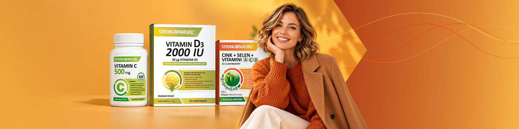 Slika koja prikazuje pakovanja suplemenata vitamin D3 vitamin C i cink uz nasmejanu ženu